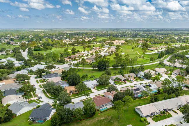 Aerial view of an established Spring Hill, Florida neighborhood